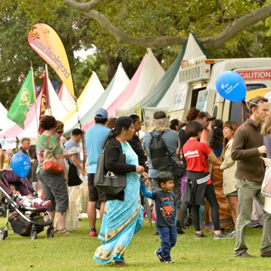 People lining up for food tents